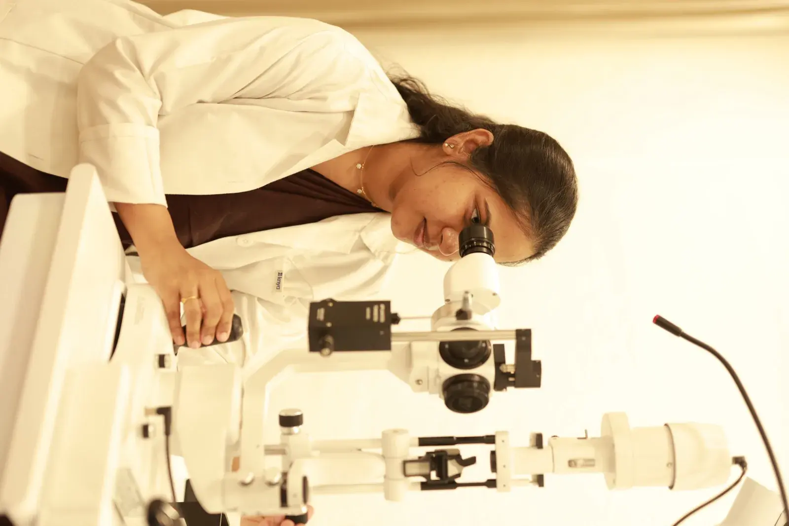A slit lamp eye examination in progress